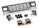 [ TRX-8070 ] Traxxas Grill, Ford Bronco/ grill retainers (3) / Headlight housing (2) lens (2) fits #8010 body - TRX8070